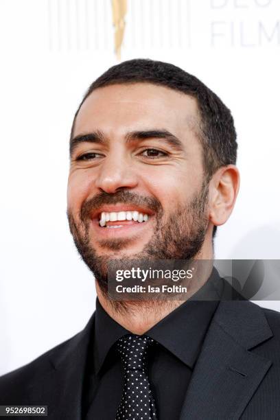 German actor Elyas MBarek attends the Lola - German Film Award red carpet at Messe Berlin on April 27, 2018 in Berlin, Germany.