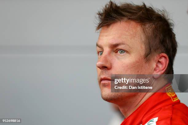 Second place finisher Kimi Raikkonen of Finland and Ferrari looks on in parc ferme during the Azerbaijan Formula One Grand Prix at Baku City Circuit...