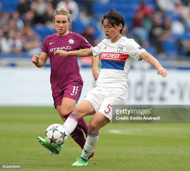 Saki Kumagai of Olympique Lyonnais is challenged by Isobel Christiansen of Manchester City Women during the UEFA Women's Champions League, Semi Final...