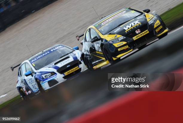 Jack Goff of WIX Racing with Eurotech, driving a Honda Civic Type R and Ashley Sutton of Adrian Flux BMR Subaru Racing, driving a Subaru Levorg GT...