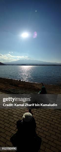 mt fuji and visitors - kamal zharif stockfoto's en -beelden