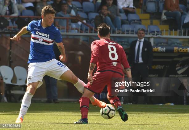 Dawid Kownacki of Sampdoria opposed to Luca Cigarini of Cagliari during the serie A match between UC Sampdoria and Cagliari Calcio at Stadio Luigi...