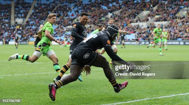 Christian Wade of Wasps scores his second try during the Aviva Premiership match between Wasps and Northampton Saints at The Ricoh Arena on April 29,...