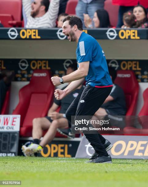 Head coach Sandro Schwarz of Mainz celebrates his team's second goal during the Bundesliga match between 1. FSV Mainz 05 and RB Leipzig at Opel Arena...