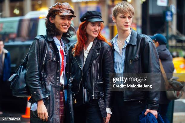 Models David Yang, Julia Banas, Dominik Sadoch after the Sies Marjan show on February 11, 2018 in New York City. David wears a python leather...