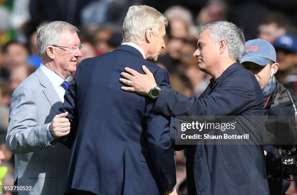 Sir Alex Ferguson and Jose Mourinho, Manager of Manchester United greet Arsene Wenger, Manager of Arsenal pitchside prior to the Premier League match...