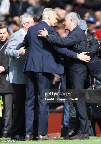 Sir Alex Ferguson and Jose Mourinho, Manager of Manchester United greet Arsene Wenger, Manager of Arsenal pitchside prior to the Premier League match...