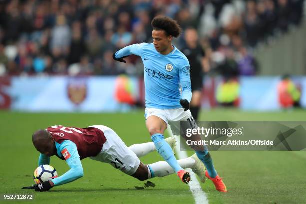 Leroy Sane of Manchester City in action with Angelo Ogbonna of West Ham during the Premier League match between West Ham United and Manchester City...