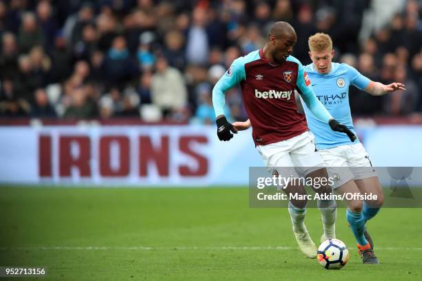 Angelo Ogbonna of West Ham in action with Kevin De Bruyne of Manchester City during the Premier League match between West Ham United and Manchester...