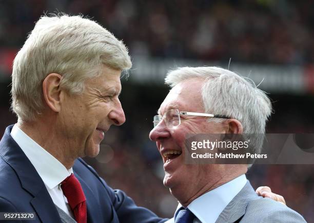 Former Manager Sir Alex Ferguson of Manchester United greets Manager Arsene Wenger of Arsenal ahead of the Premier League match between Manchester...