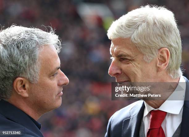 Manager Jose Mourinho of Manchester United greets Manager Arsene Wenger of Arsenal ahead of the Premier League match between Manchester United and...