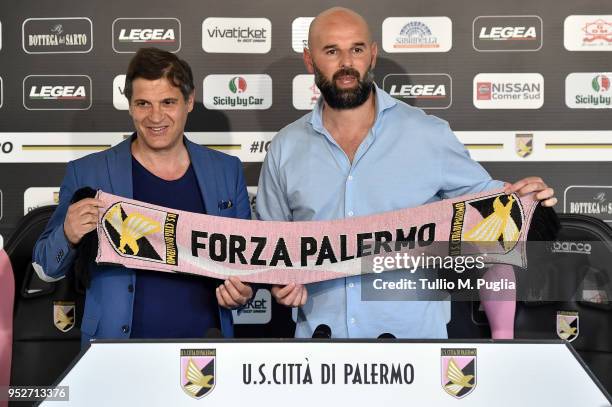 Sport Director Aladino Valoti and Roberto Stellone, new head coach of US Citta' di Palermo, pose before a press conference at Carmelo Onorato...