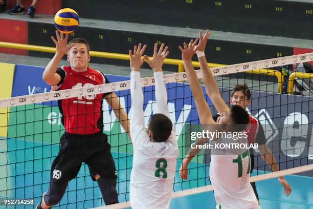 In attack Denis Abramov during the Bulgaria-Swiss match in the qualifying tourney for the European Championships for Men Under 20 Volleyball ....