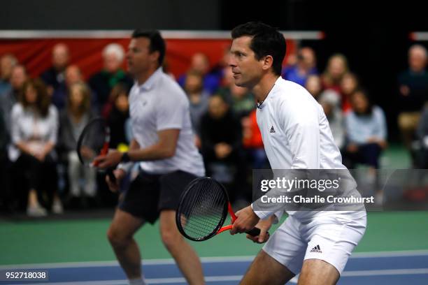 Tim Henman in action during The Lawn Tennis Association celebratory 50 years of Open Era tennis at the West Hants Club in Bournemouth, back where the...