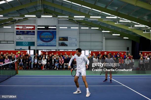 Tim Henman in action during The Lawn Tennis Association celebratory 50 years of Open Era tennis at the West Hants Club in Bournemouth, back where the...