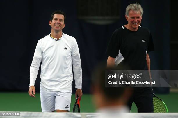 Tim Henman in action during The Lawn Tennis Association celebratory 50 years of Open Era tennis at the West Hants Club in Bournemouth, back where the...