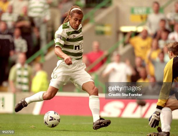 Henrik Larsson of Celtic in action during the Scottish Premier League match against Rangers at Celtic Park in Glasgow, Scotland. Celtic won the game...