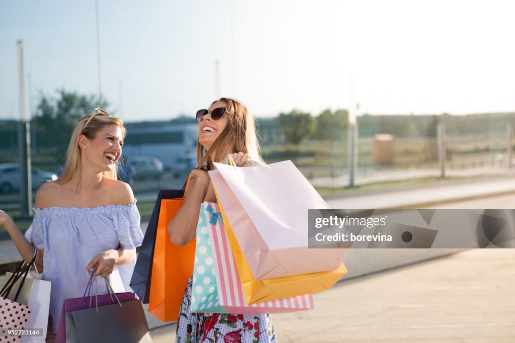 Lucky shopping in a shopping center with your best friend.