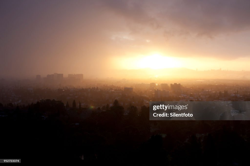 Sunlight Caught Under Impending Storm Clouds, Oakland, California