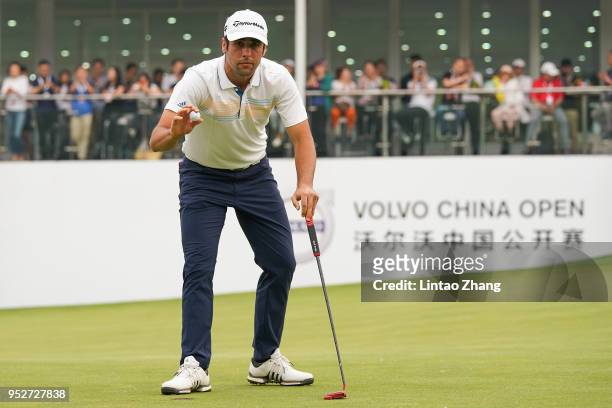 Adrian Otaegui of Spain waves his ball to the fans during the final round of the 2018 Volvo China Open at Topwin Golf and Country Club on April 29,...