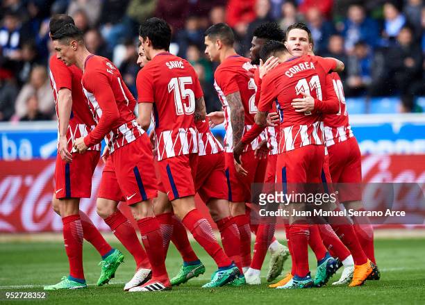 Kevin Gameiro of Atletico Madrid celebrates with his teammate Angel Correa of Atletico Madrid after scoring the opening goal during the La Liga match...