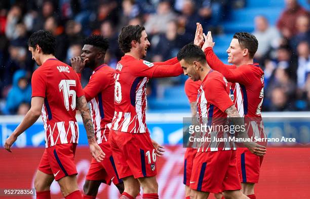 Kevin Gameiro of Atletico Madrid celebrates with his teammate Sime Vrsaljko of Atletico Madrid after scoring the opening goal during the La Liga...