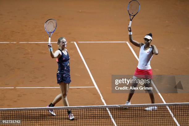 Raquel Atawo of the United States and Anna-Lena Groenefeld of Germany celebrate after winning the doubles final match against Nicole Melichar of the...