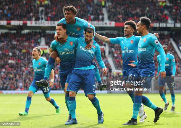 Henrikh Mkhitaryan of Arsenal celebrates after scoring his sides first goal with Granit Xhaka of Arsenal, Alex Iwobi of Arsenal, Reiss Nelson of...
