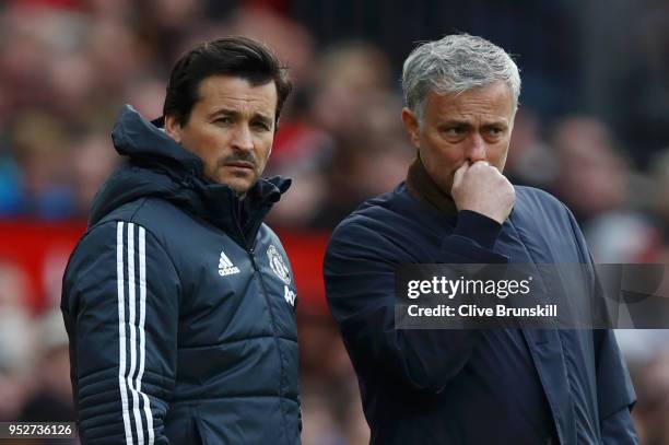 Jose Mourinho, Manager of Manchester United and Rui Faria, Manchester United assistant manager look on during the Premier League match between...
