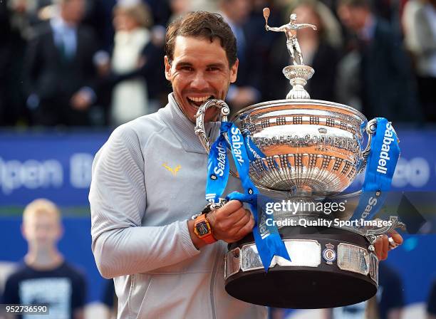 Rafael Nadal of Spain celebrates with the trophy after winning the Barcelona Open Banc Sabadell against Stefanos Tsitsipas of Greece during day...