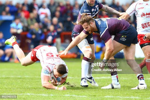 James Donaldson of Hull KR goes down after being tackled by Anthony Mullally of Leeds Rhinos during the BetFred Super League match between Hull KR...