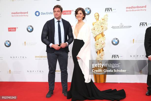 Ronald Zehrfeld and Christina Hecke during the Lola - German Film Award red carpet at Messe Berlin on April 27, 2018 in Berlin, Germany.