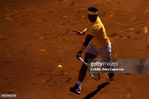 Rafael Nadal of Spain plays a forehand against Stefanos Tsitsipas of Greece in their final match during day seven of the Barcelona Open Banc Sabadell...