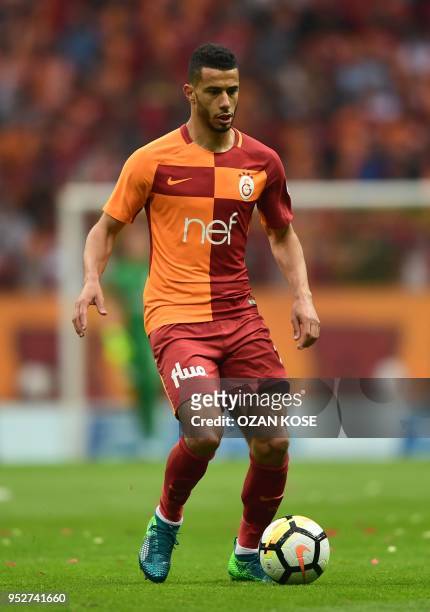 Galatasaray's Moroccan midfielder Younes Belhanda controls the ball during the Turkish Spor Toto Super league football match between Galataray and...