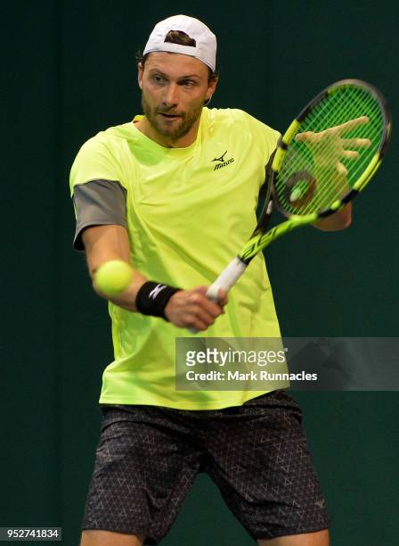 Daniel Brands of Germany in action during his singles qualifying match with Emil Ruusuvuori of Finland on the second day of The Glasgow Trophy at...