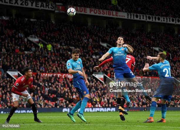 Marouane Fellaini of Manchester United scores his sides second goal during the Premier League match between Manchester United and Arsenal at Old...