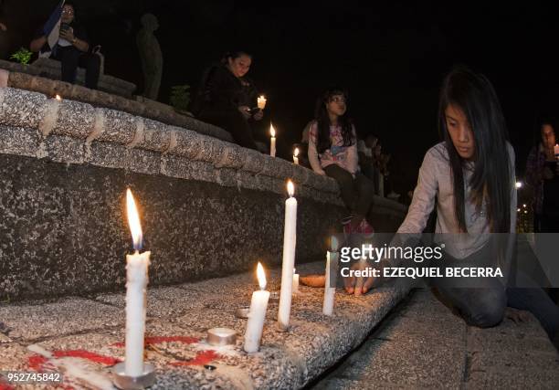 Nicaraguan inmigrants living in Costa Rica demonstrate in support of Nicaraguans protesting against government's pension reforms during a vigil at...