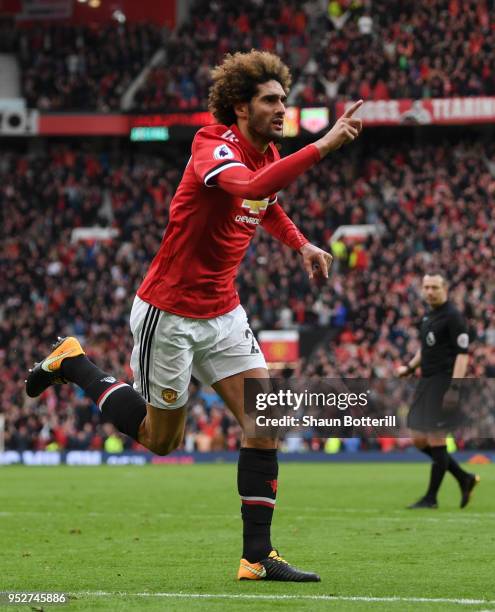 Marouane Fellaini of Manchester United celebrates after scoring his sides second goal during the Premier League match between Manchester United and...