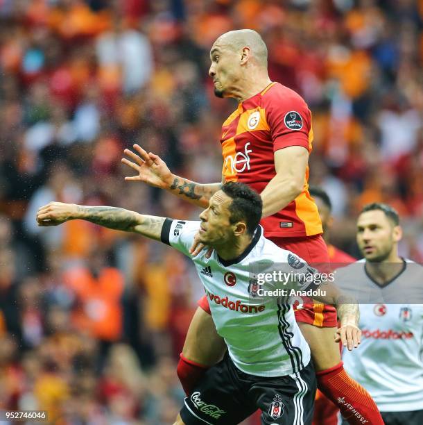 Maicon of Galatasaray in action against Adriano of Besiktas during Turkish Super Lig soccer match between Galatasaray and Besiktas at Turk Telekom...