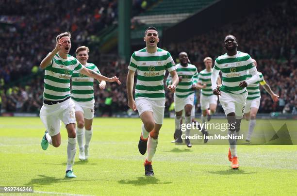 Tomas Rogic of Celtic celebrates scoring his team's fourth goal during the Scottish Premier League match between Celtic and Rangers at Celtic Park on...