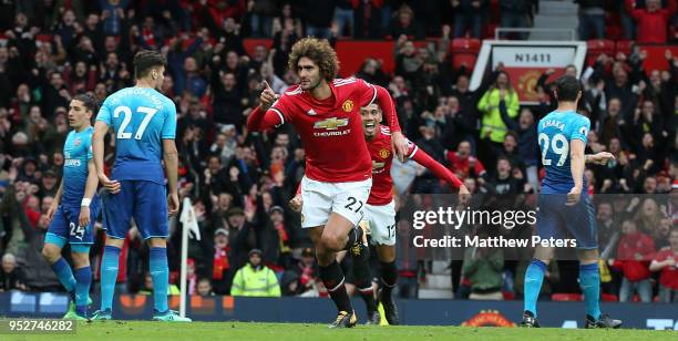 Marouane Fellaini of Manchester United celebrates scoring their second goal during the Premier League match between Manchester United and Arsenal at...