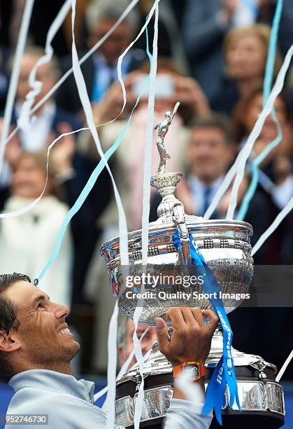 Rafael Nadal of Spain celebrates with the trophy after winning the Barcelona Open Banc Sabadell against Stefanos Tsitsipas of Greece during day...