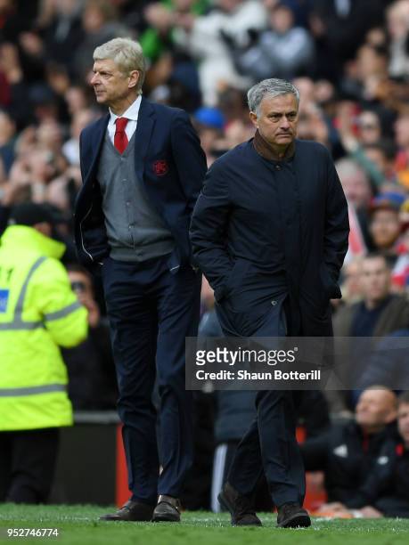 Arsene Wenger, Manager of Arsenal and Jose Mourinho, Manager of Manchester United head for the tunnel following the Premier League match between...