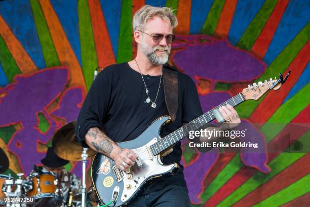 Anders Osborne performs with Voice of the Wetlands All-Stars during the New Orleans Jazz & Heritage Festival at Fair Grounds Race Course on April 28,...