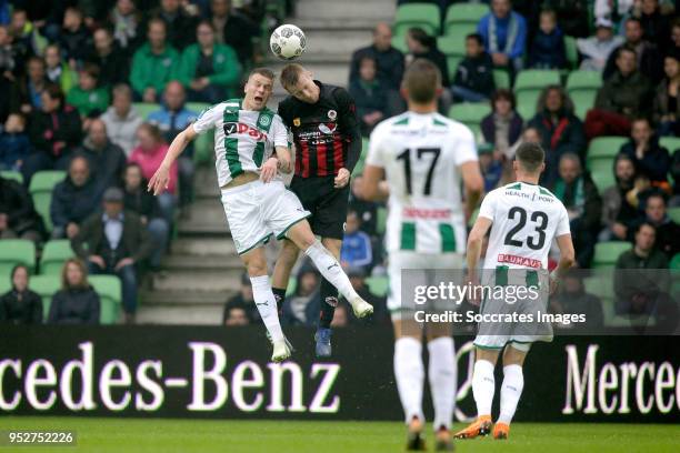 Samir Memisevic of FC Groningen, Mike van Duinen of Excelsior during the Dutch Eredivisie match between FC Groningen v Excelsior at the NoordLease...