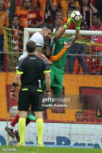 Goalkeeper Muslera of Galatasaray in action against Alvaro Negredo of Besiktas during Turkish Super Lig soccer match between Galatasaray and Besiktas...