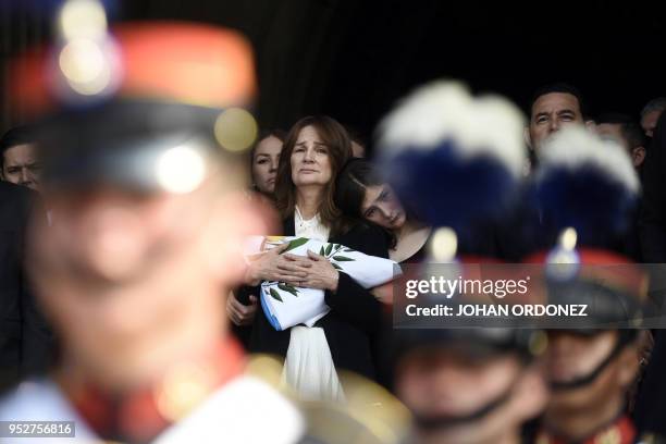 Patricia Escobar widow of former Guatemalan President and Guatemala City Mayor, Alvaro Arzu, grieves during his funeral at Culture Palace in...