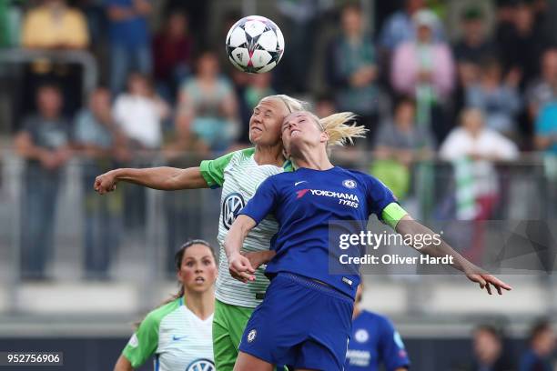 Pernille Harder of Wolfsburg and Katie Chapman of Chelsea compete for the ball during the Women's UEFA Champions League semi final second leg match...