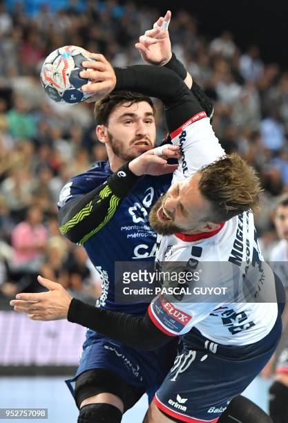 Montpellier's pivot Ludovic Fabregas defends against Flensburg's centre Thomas Mogensen during the EHF Champions League quarter-final handball match...