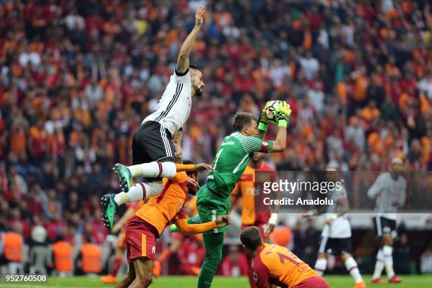 Fernando Muslera of Galatasaray in action against Alvaro Negredo of Besiktas during Turkish Super Lig soccer match between Galatasaray and Besiktas...